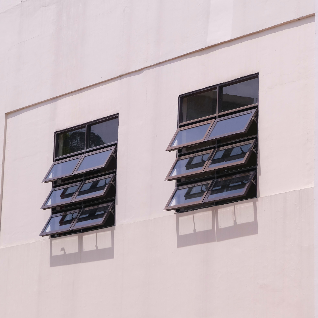 The picture features awning glass windows with a black frame.